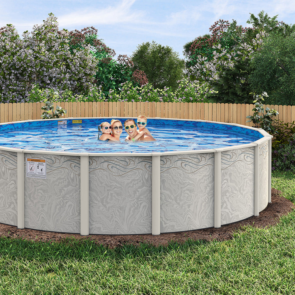 Four people wearing sunglasses smile and pose together in a backyard H.I.I. Embassy 12' Silver Interlude 8" Hybrid Frame Round Pool & Bundle, surrounded by grass, trees, and a wooden fence.