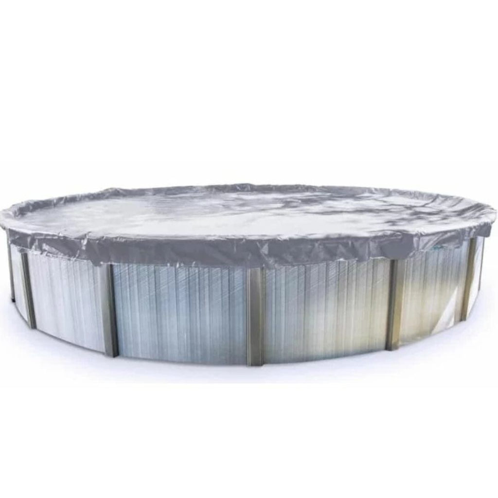 The SwimmingPoolDiscounters Extreme Duty Winter Cover is a heavy-duty, UV-stabilized gray polyethylene cover fitted over a round above-ground pool with a metallic exterior.