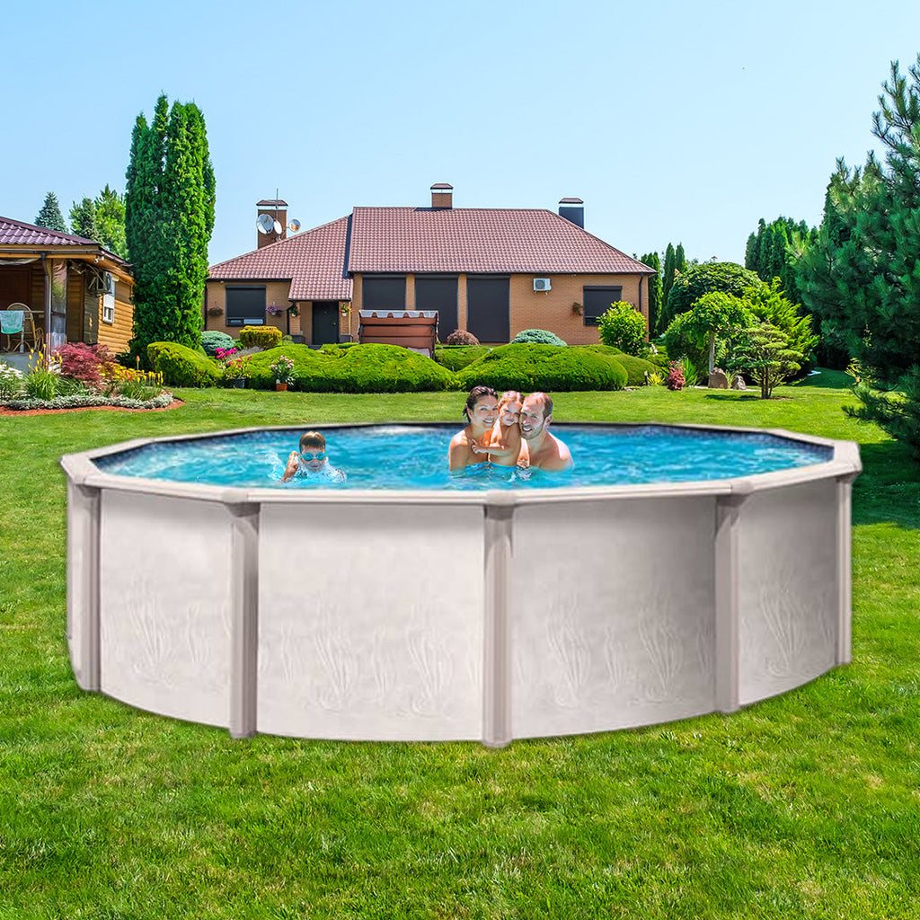 A family of four enjoys swimming in a Trevi 27' x 52" Trevi 186 7" Hybrid Frame Round Pool, set up in a grassy backyard on a sunny day with landscaped bushes and a large house in the background.
