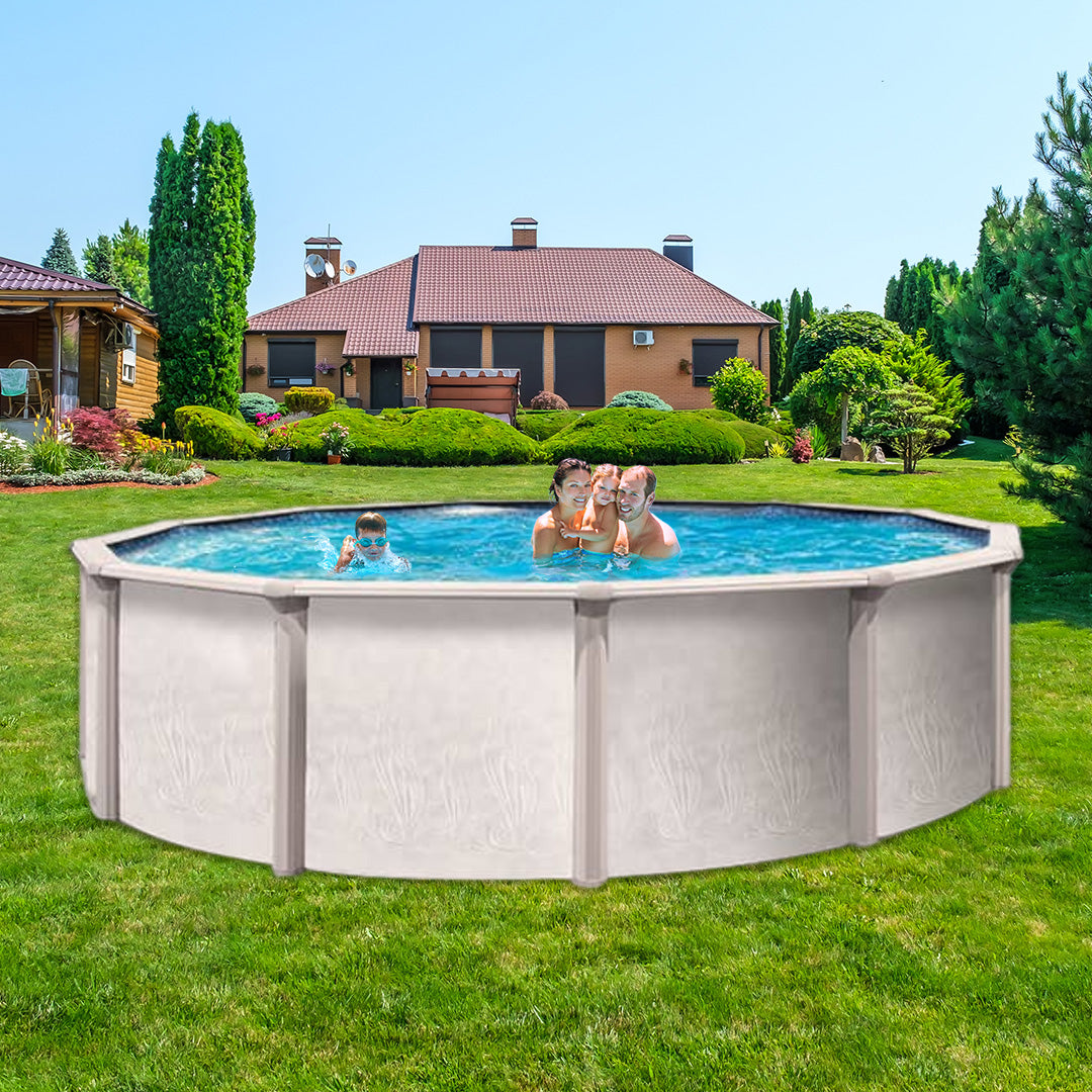 A family of four enjoys swimming in a Trevi 27' x 52" Trevi 186 7" Hybrid Frame Round Pool, set up in a grassy backyard on a sunny day with landscaped bushes and a large house in the background.