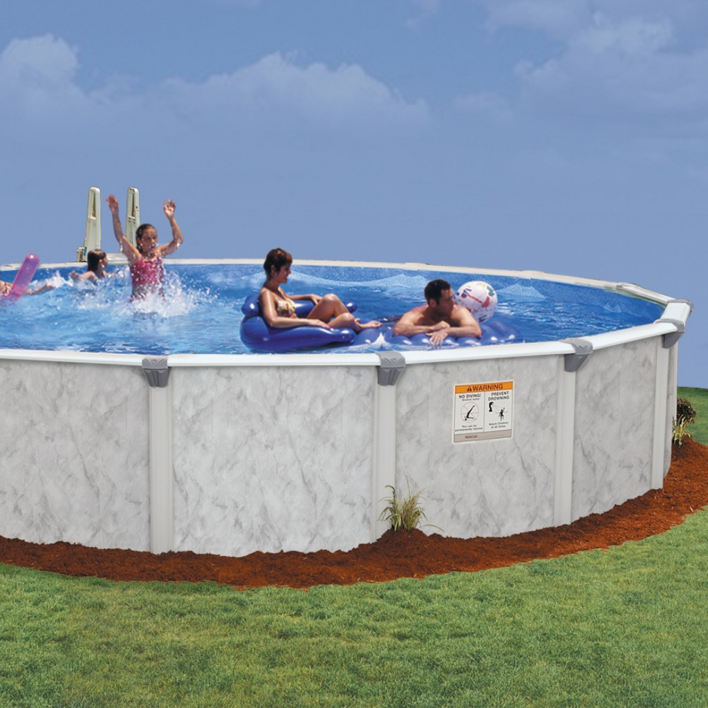 Five people enjoy a sunny day in the H.I.I. Embassy 12' x 54" Sea Shore Hybrid 7" Frame Round Pool, splashing and relaxing on floats. The above-ground pool bundle sits surrounded by grass and mulch.