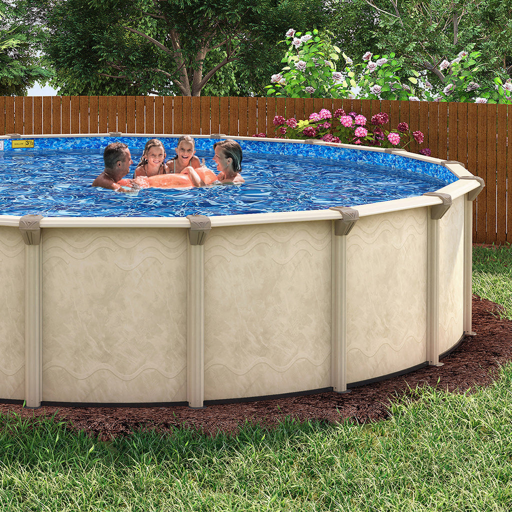 Four children smile and play together in an H.I.I. Embassy 8' Coral Sea 7" Steel Frame Round Pool & Bundle (52" or 54") in a backyard with grass, trees, and a wooden fence decorated with blooming flowers.