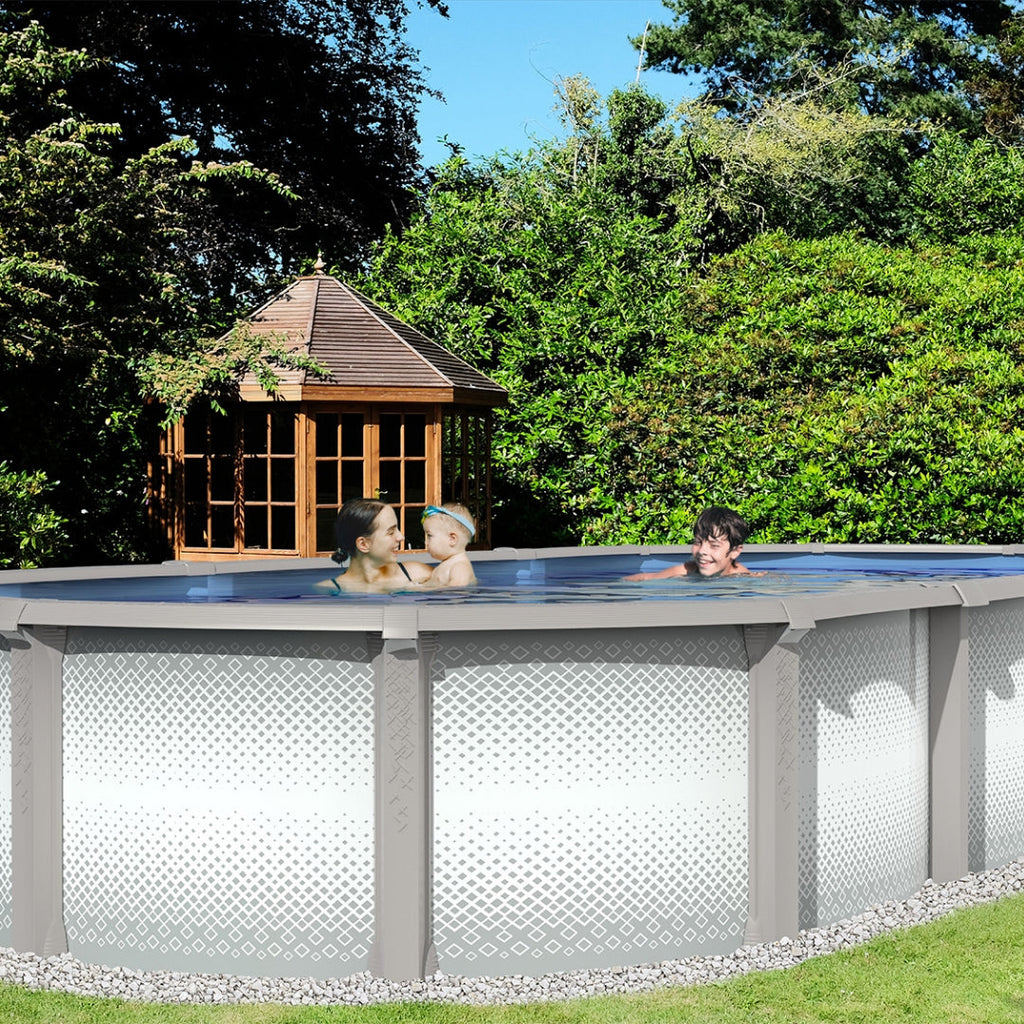 Three people, including a child, swim and chat in an SPD 15' x 30' x 54" Jumbo 10" Resin Salt Oval Pool in a garden with trees, bushes, and a wooden gazebo with a peaked roof for a relaxing outdoor atmosphere.