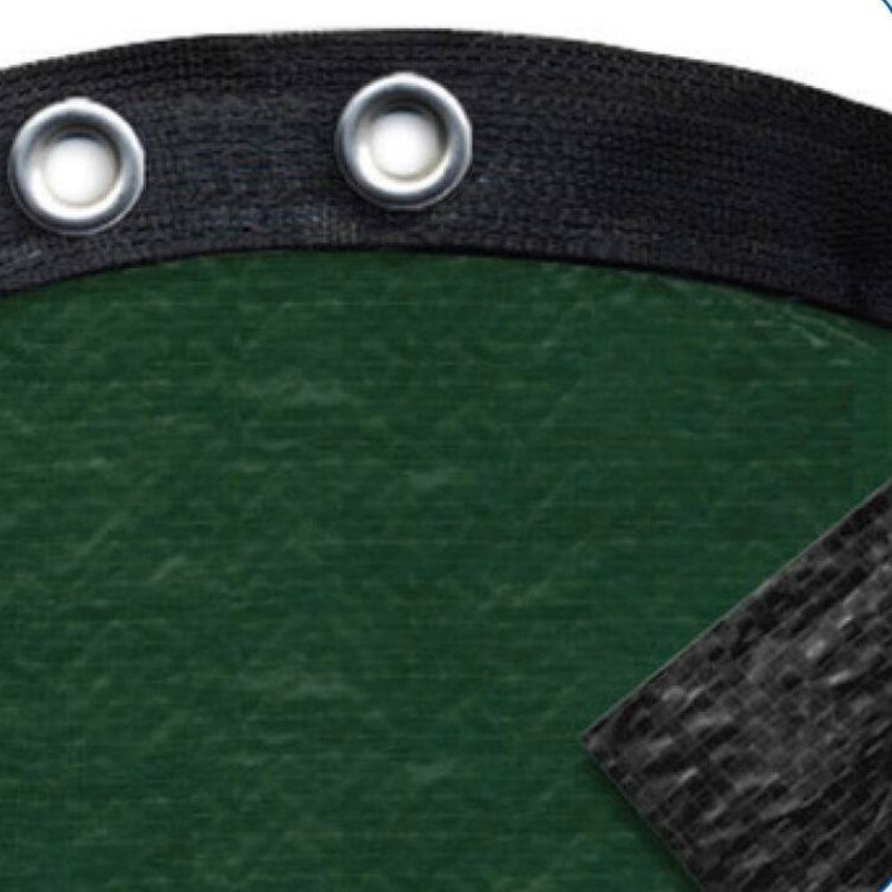 Close-up of the Lomart Deluxe 12ft x 20ft Oval Winter Pool Cover, dark green and UV stabilized, with black reinforced edges, metal grommets, and a folded corner revealing its layered construction.